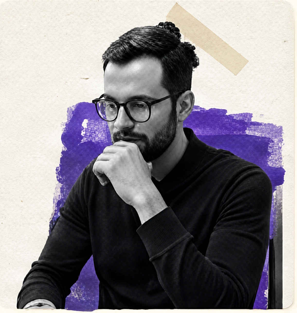 Recruiter with glasses and short beard in a thoughtful pose